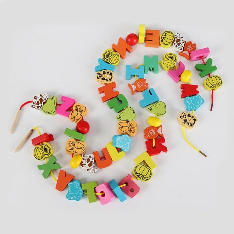 26pcs Wooden beads for toddlers w/cord for Stringing.