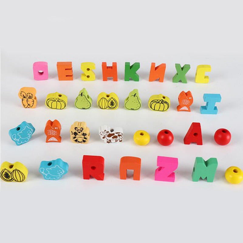 26pcs Wooden beads for toddlers w/cord for Stringing.