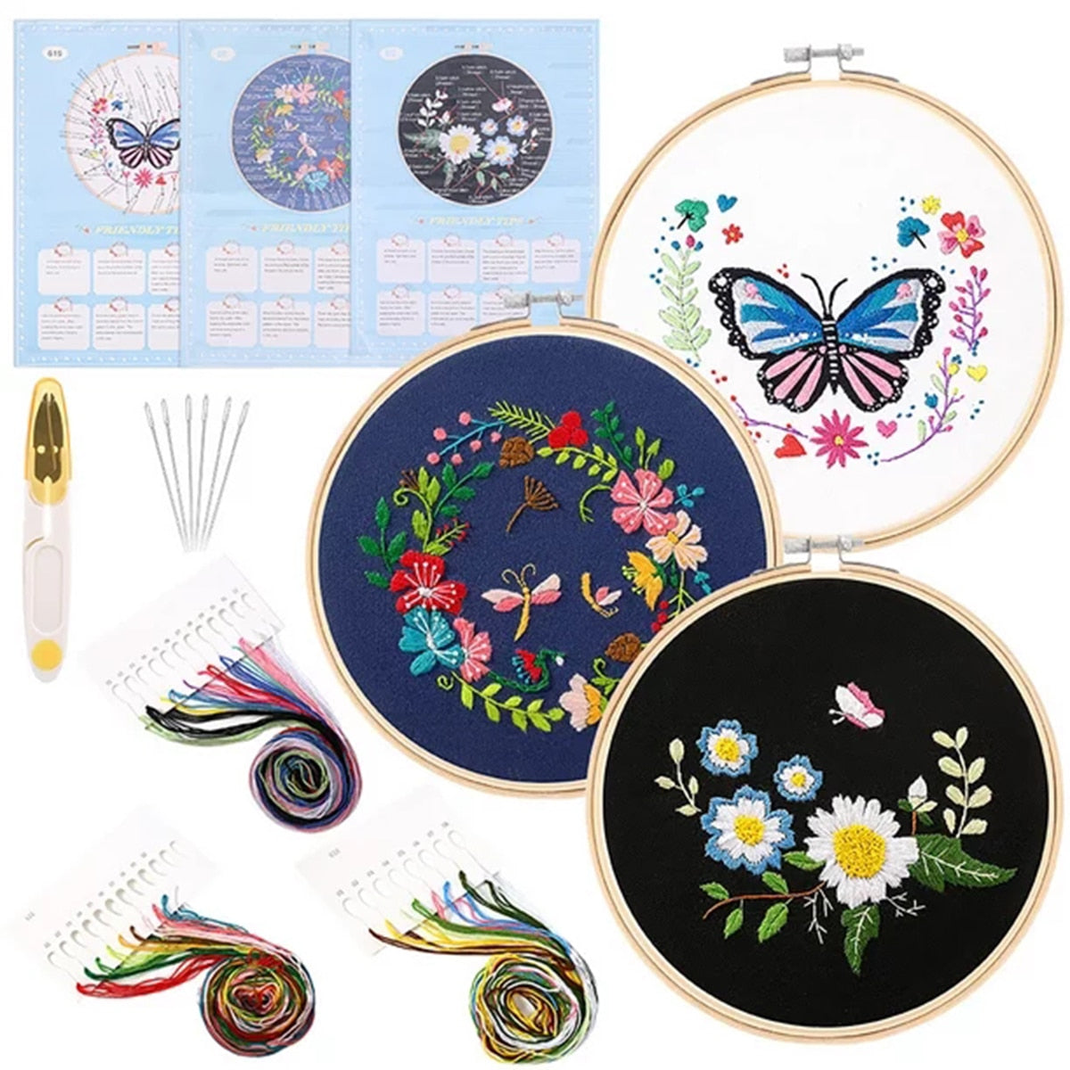 Embroidery Kit includes: Hoop, Cloth, Needles, Threads, Scissors.